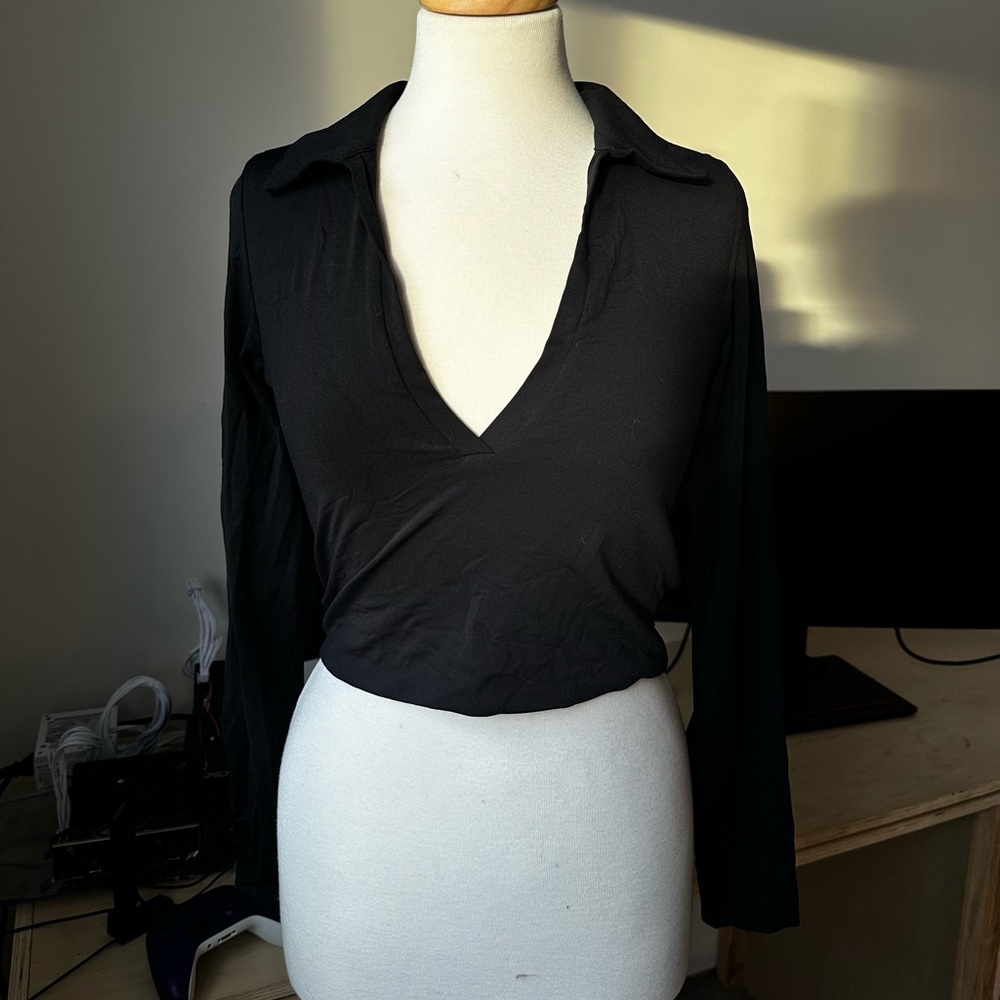 Babaton contour polo long sleeve. Good lightly used condition

Size L